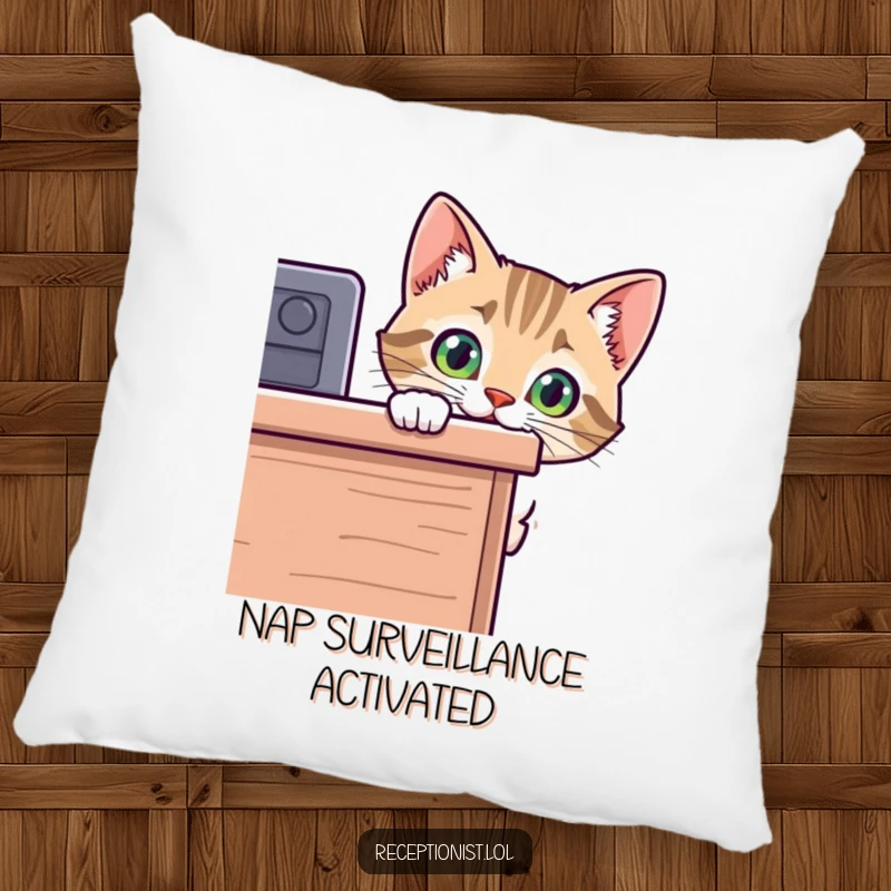 Funny cat pillow with a curious kitten peeking over a desk, offering comfort and a humorous visual gag for any living space.