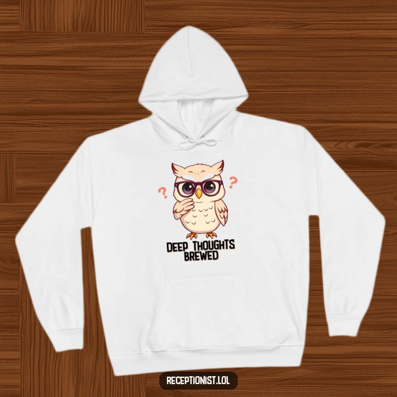 Funny owl adjusting glasses thoughtfully, featured on a warm and humorous hoodie.
