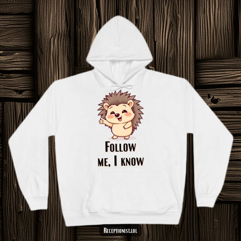 Funny hoodie showcasing a giggling hedgehog with a welcoming gesture, perfect for keeping warm and sharing a laugh.