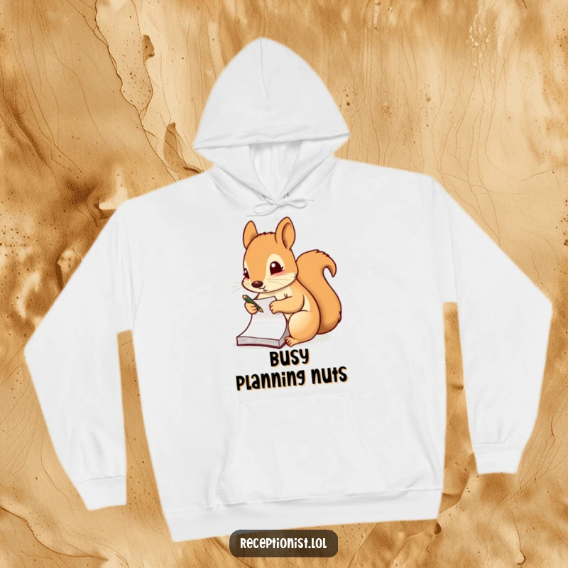 Funny hoodie featuring a diligent squirrel taking notes on a notepad, offering warmth and a symbol of focused learning.