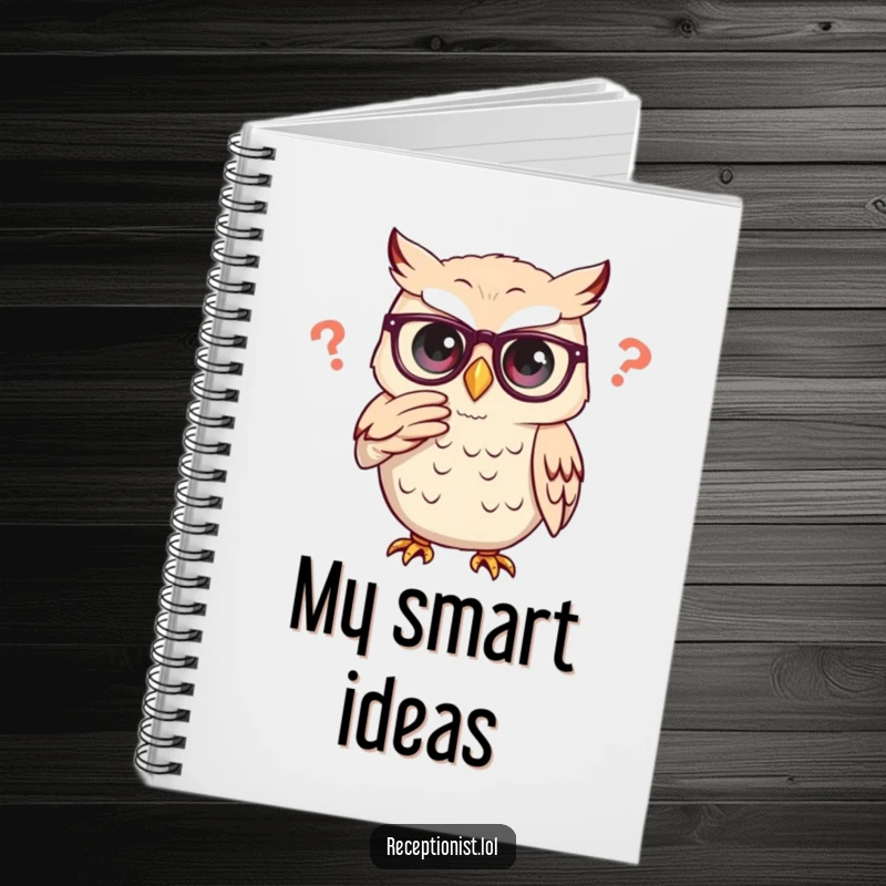 Funny owl adjusting glasses thoughtfully, on a notebook for jotting down profound ideas.