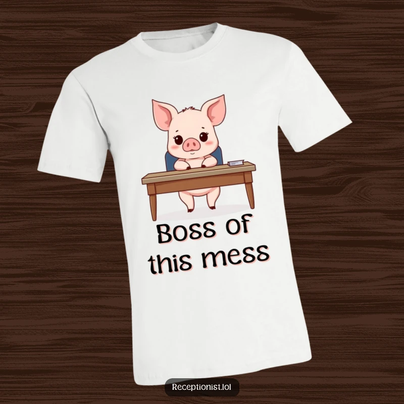 Funny Piglet Business Meeting T-Shirt showing a cute piglet behind a desk, looking expectantly at an unseen guest, ideal for office humor.