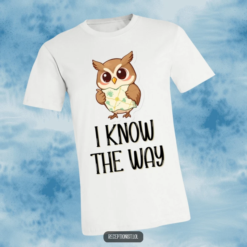 Funny t-shirt featuring a curious owl pointing to a map with a wise expression, perfect for adventurers and those who love learning.