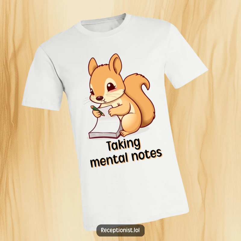 Funny t-shirt of a diligent squirrel meticulously taking notes on a small pad, celebrating focus and organization.
