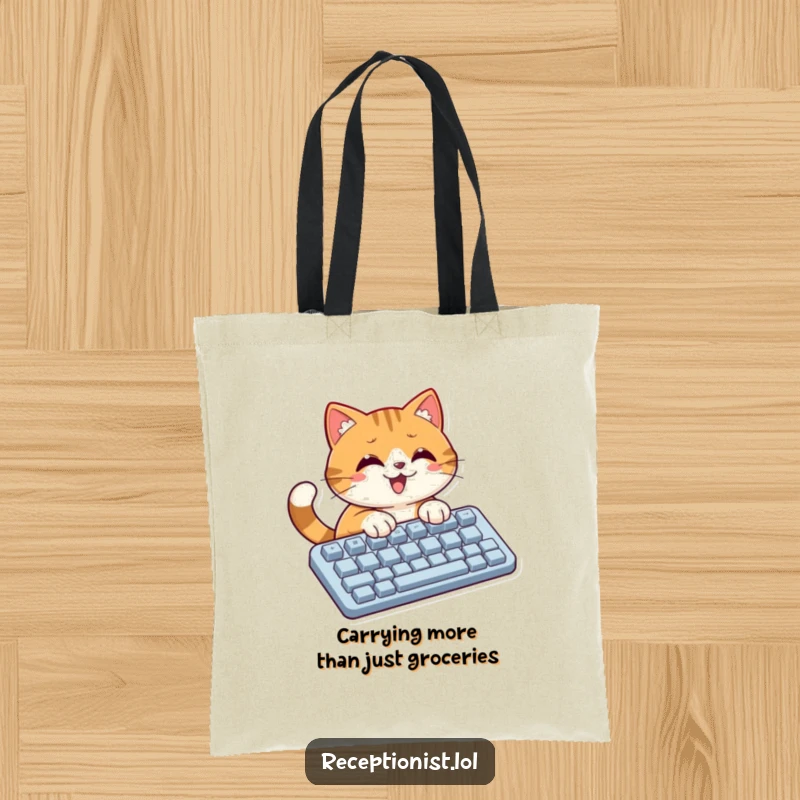 Funny cat with a determined face typing on a huge keyboard, great as a tote bag for tech enthusiasts.